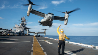 Osprey tiltrotor aircraft takes off from flight deck