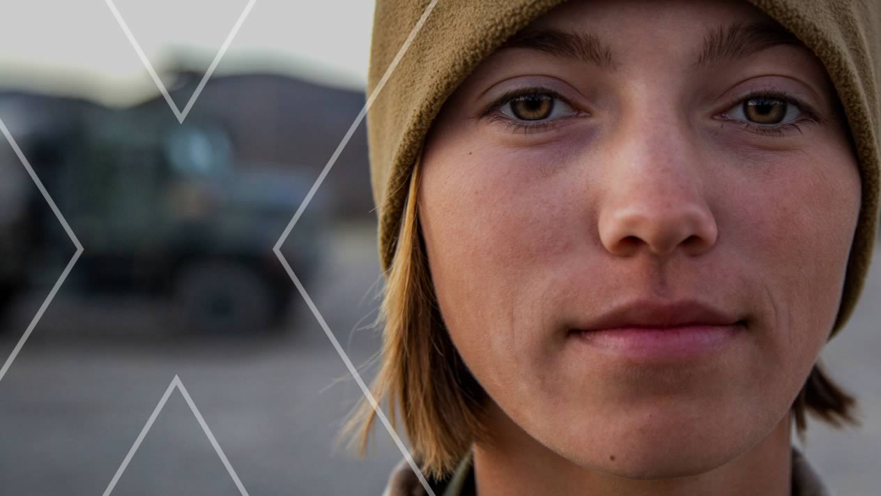 A confident Naval servicemember looking toward the future