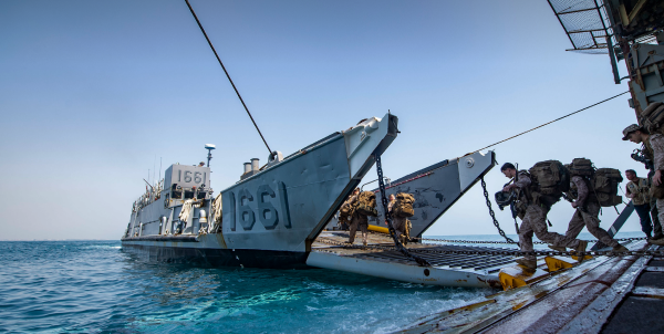 Navy ships about to be boarded by soldiers