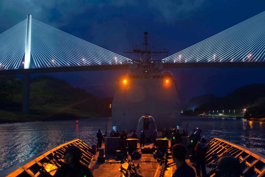 Lighted night view of the center of a Navy ship