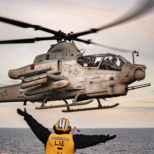 Marine helicopter lands at sea